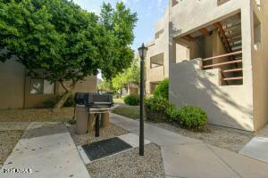 4850 East Desert Cove Avenue, Unit 227 Scottsdale, AZ 85254 - Photo 31 of 32 a view of a street with sitting area