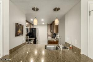 4850 East Desert Cove Avenue, Unit 227 Scottsdale, AZ 85254 - Photo 7 of 32 a view of a living room and dining room