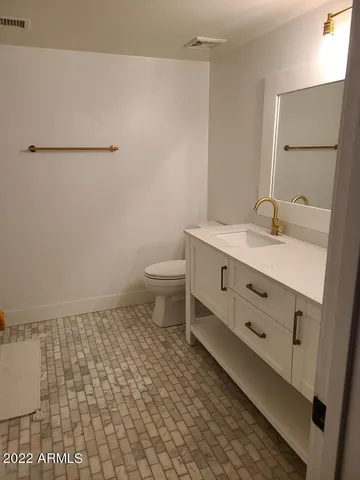 a bathroom with a shower and a bathtub