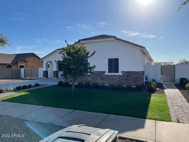 a house view with a garden space
