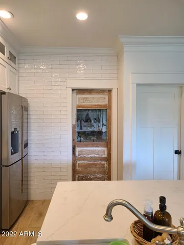 a bathroom with a sink and a shower