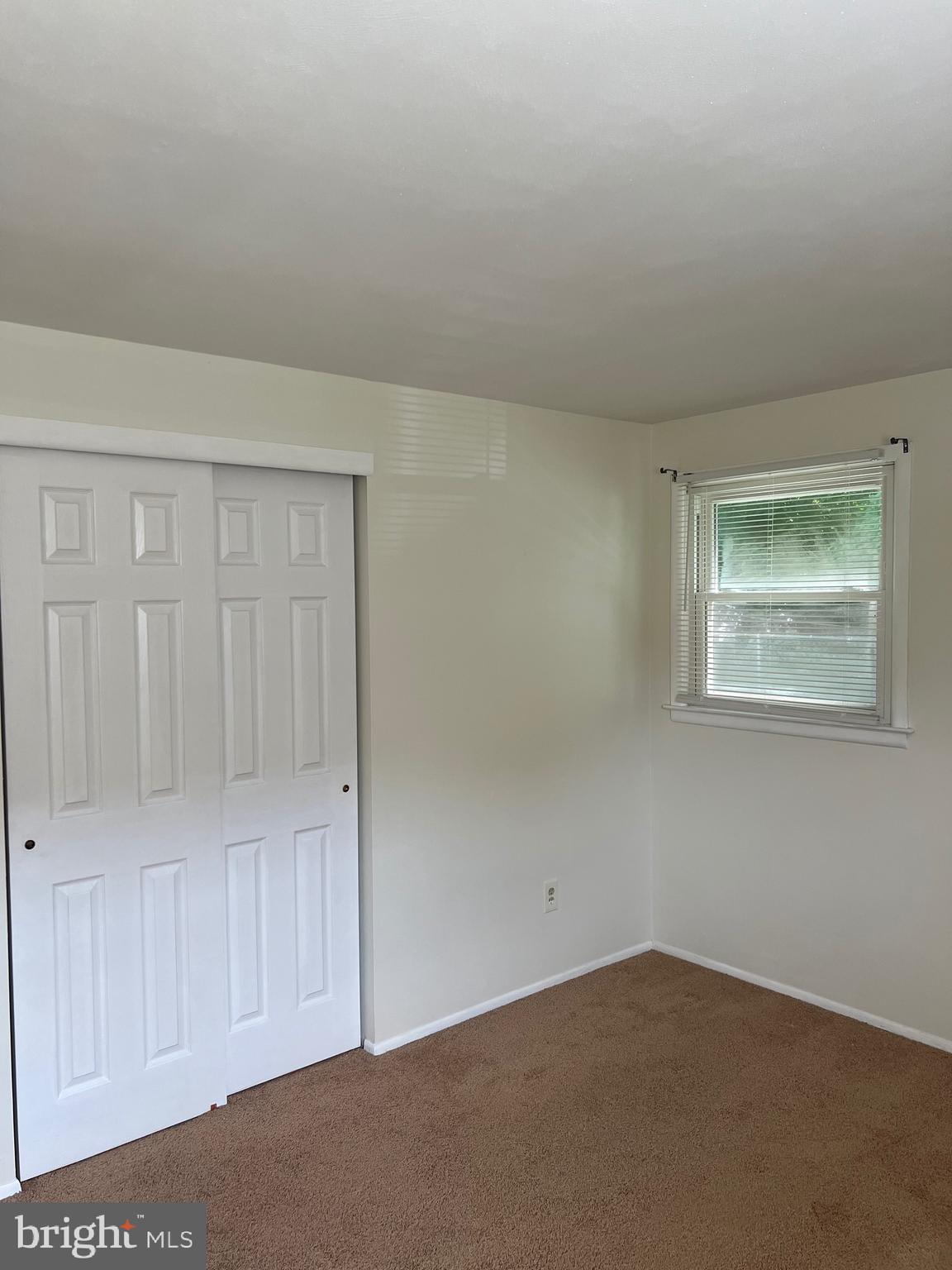 262 Evergreen Avenue, Unit 1 Hamilton, NJ 08619 - Photo 11 of 20 an empty room with windows