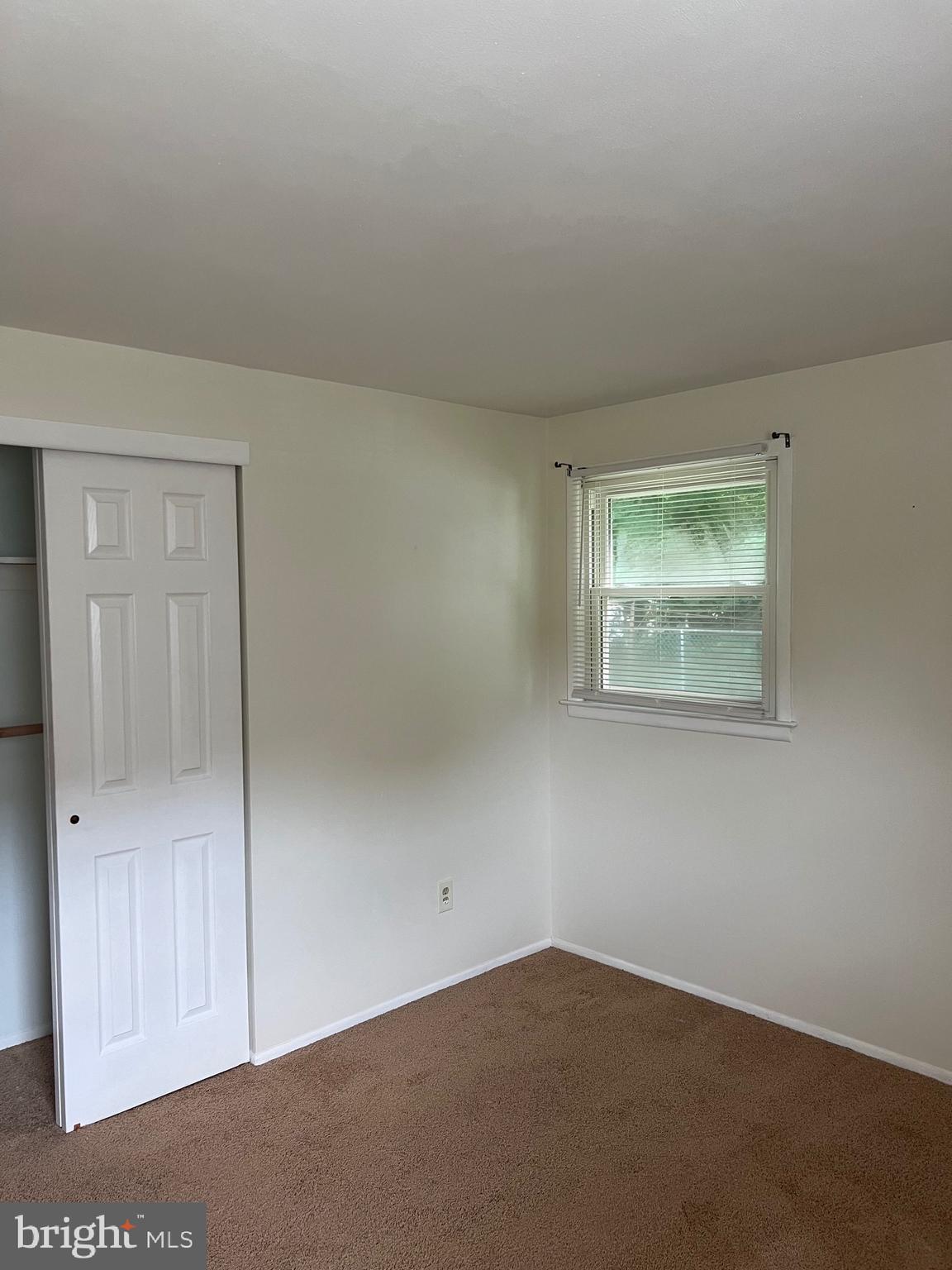 262 Evergreen Avenue, Unit 1 Hamilton, NJ 08619 - Photo 18 of 20 an empty room with windows