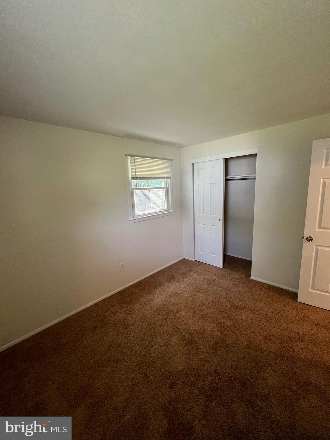 262 Evergreen Avenue, Unit 1 Hamilton, NJ 08619 - Photo 8 of 20 an empty room with windows