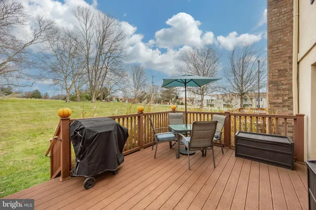 a group of cars parked in front of a house