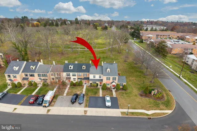 a view of swimming pool with outdoor seating