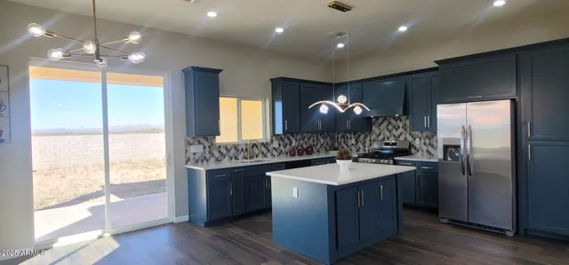 a bathroom with a sink double vanity and a mirror