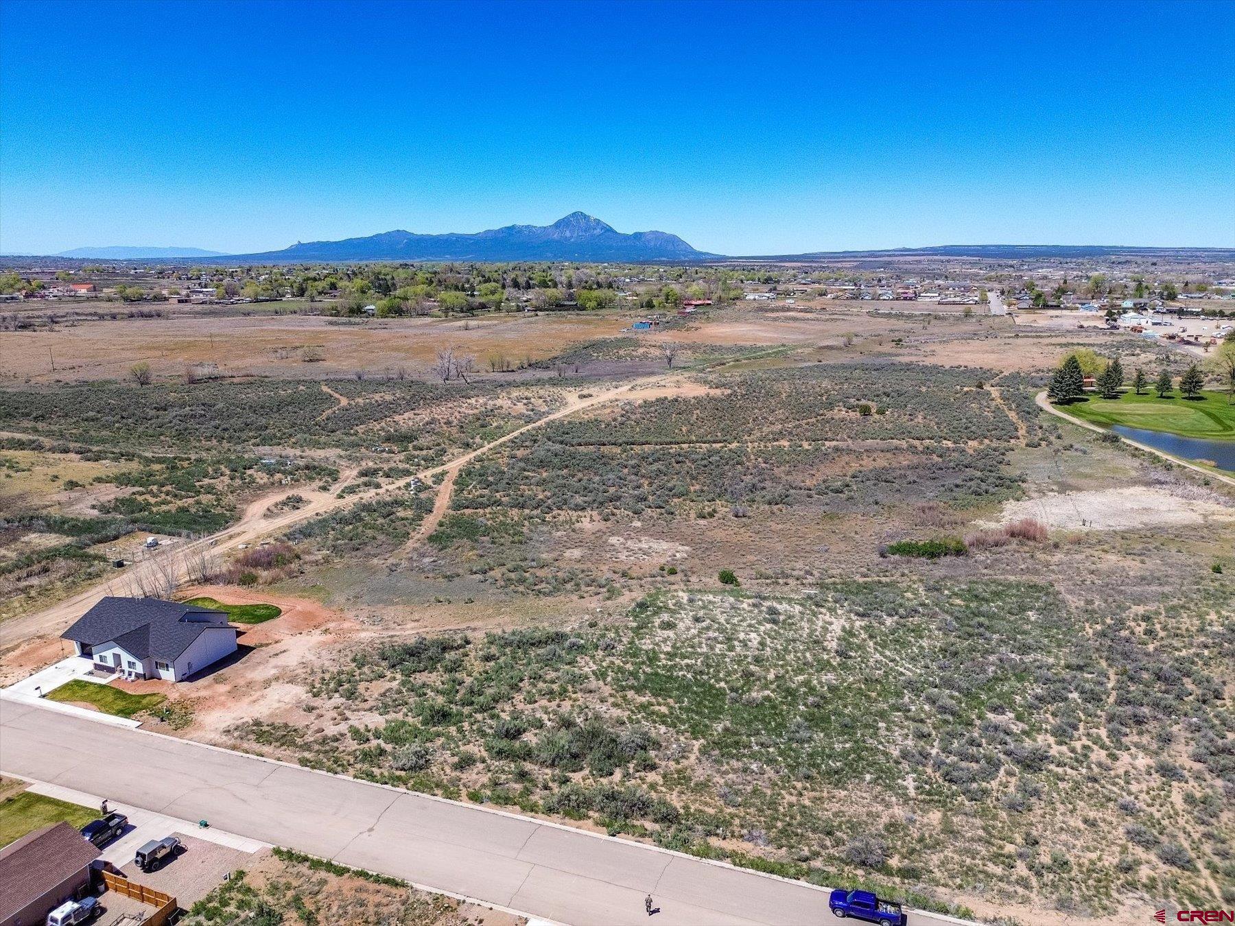 Lot 36 Golf Course Lane Cortez, CO 81321 - Photo 7 of 11 a view of a lake with a city
