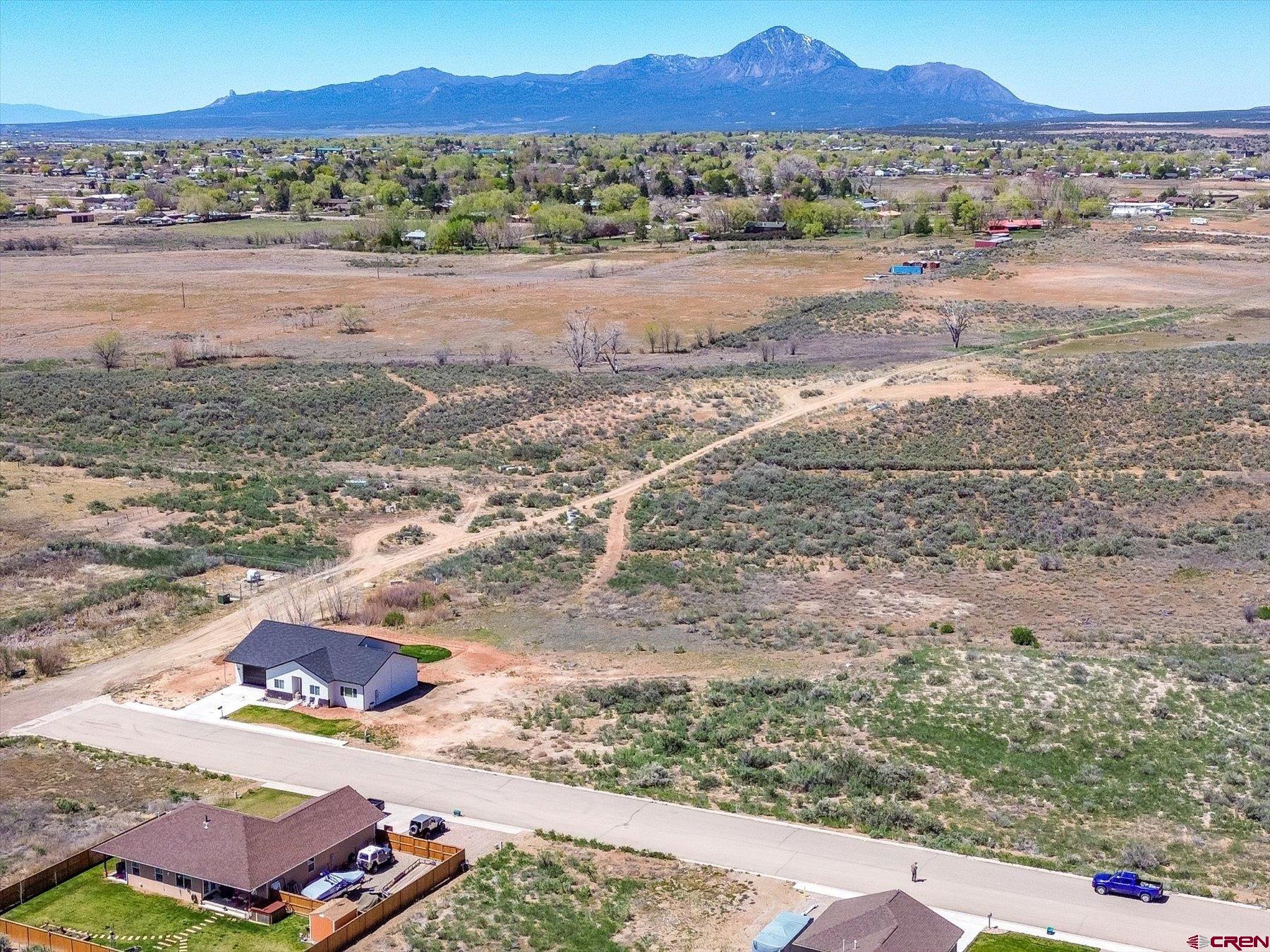 Lot 36 Golf Course Lane Cortez, CO 81321 - Photo 9 of 11 a view of a street with an ocean beach