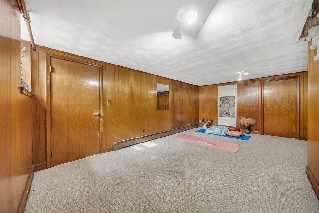 15 Spring Valley Road Belmont, MA 02478 - Photo 20 of 29 a view of a room with gym equipment