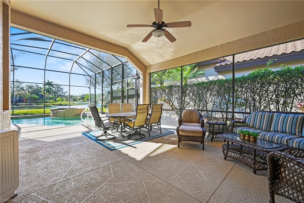 12592 Grandezza Circle Estero, FL 33928 - Photo 13 of 40 a building outdoor space with patio furniture and a potted plant