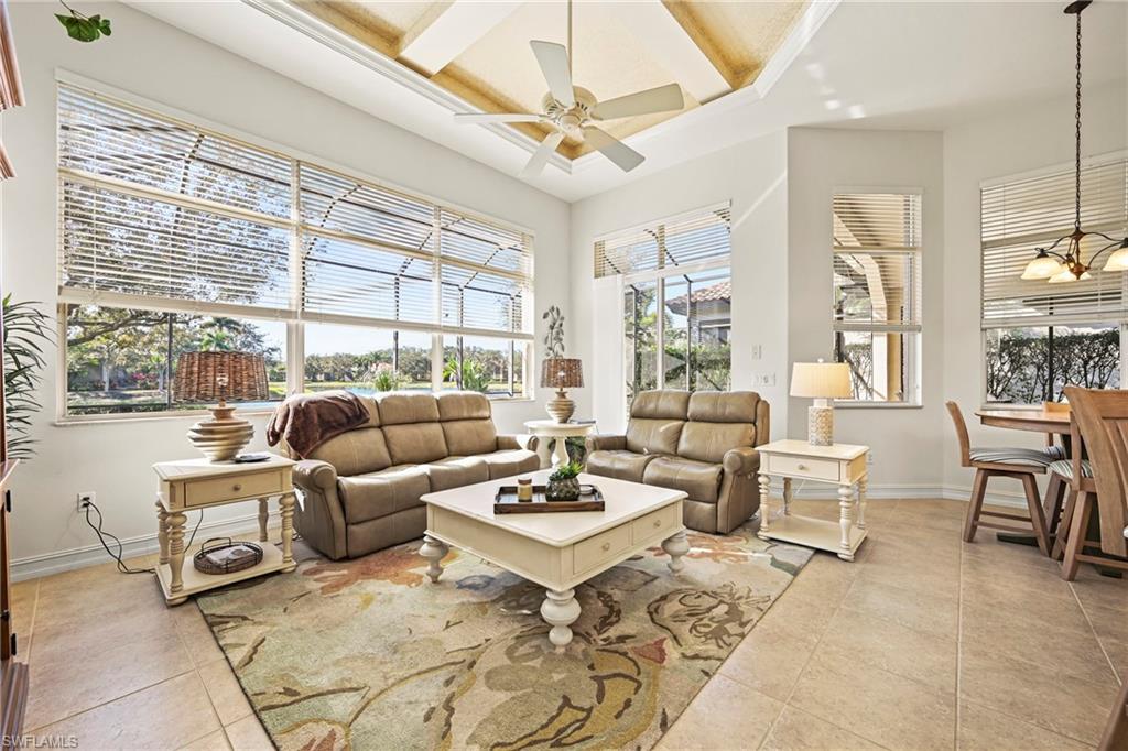 12592 Grandezza Circle Estero, FL 33928 - Photo 2 of 40 a living room with furniture and a large window