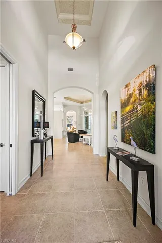 a view of a livingroom with furniture and a flat screen tv