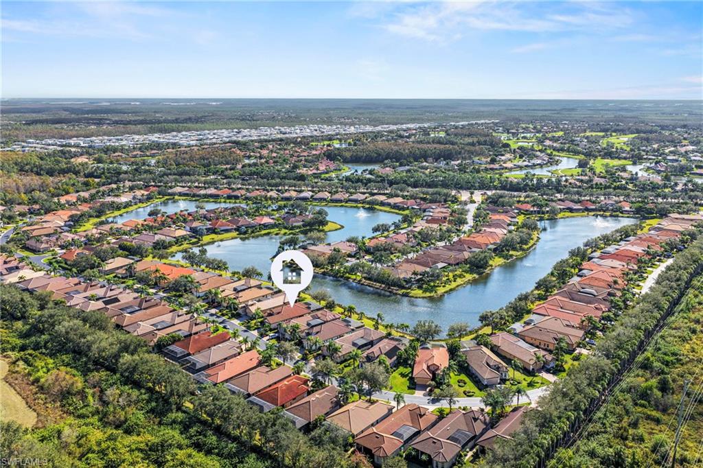 12592 Grandezza Circle Estero, FL 33928 - Photo 28 of 40 an aerial view of city and lake