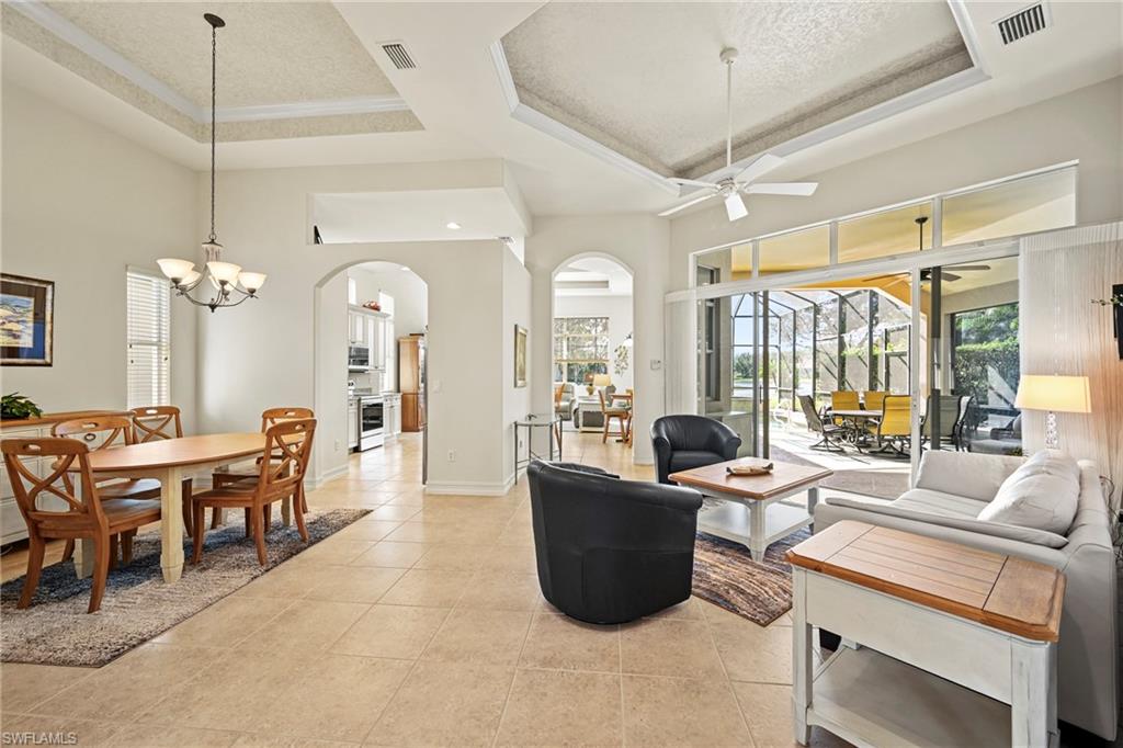 12592 Grandezza Circle Estero, FL 33928 - Photo 9 of 40 a view of a dining room with furniture window and outside view