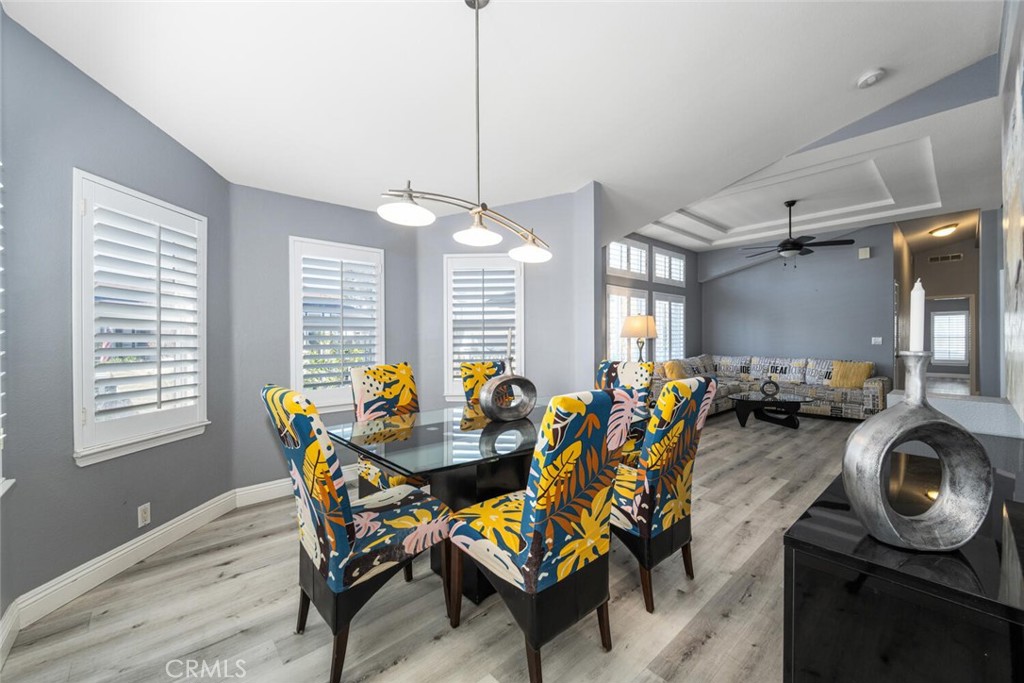 16222 Monterey Lane, Unit 371 Huntington Beach, CA 92649 - Photo 20 of 70 Formal dining area opens to living room.