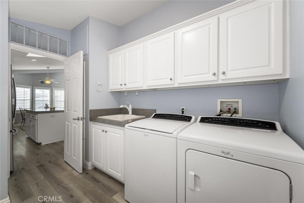 16222 Monterey Lane, Unit 371 Huntington Beach, CA 92649 - Photo 44 of 70 a utility room with dryer and washer