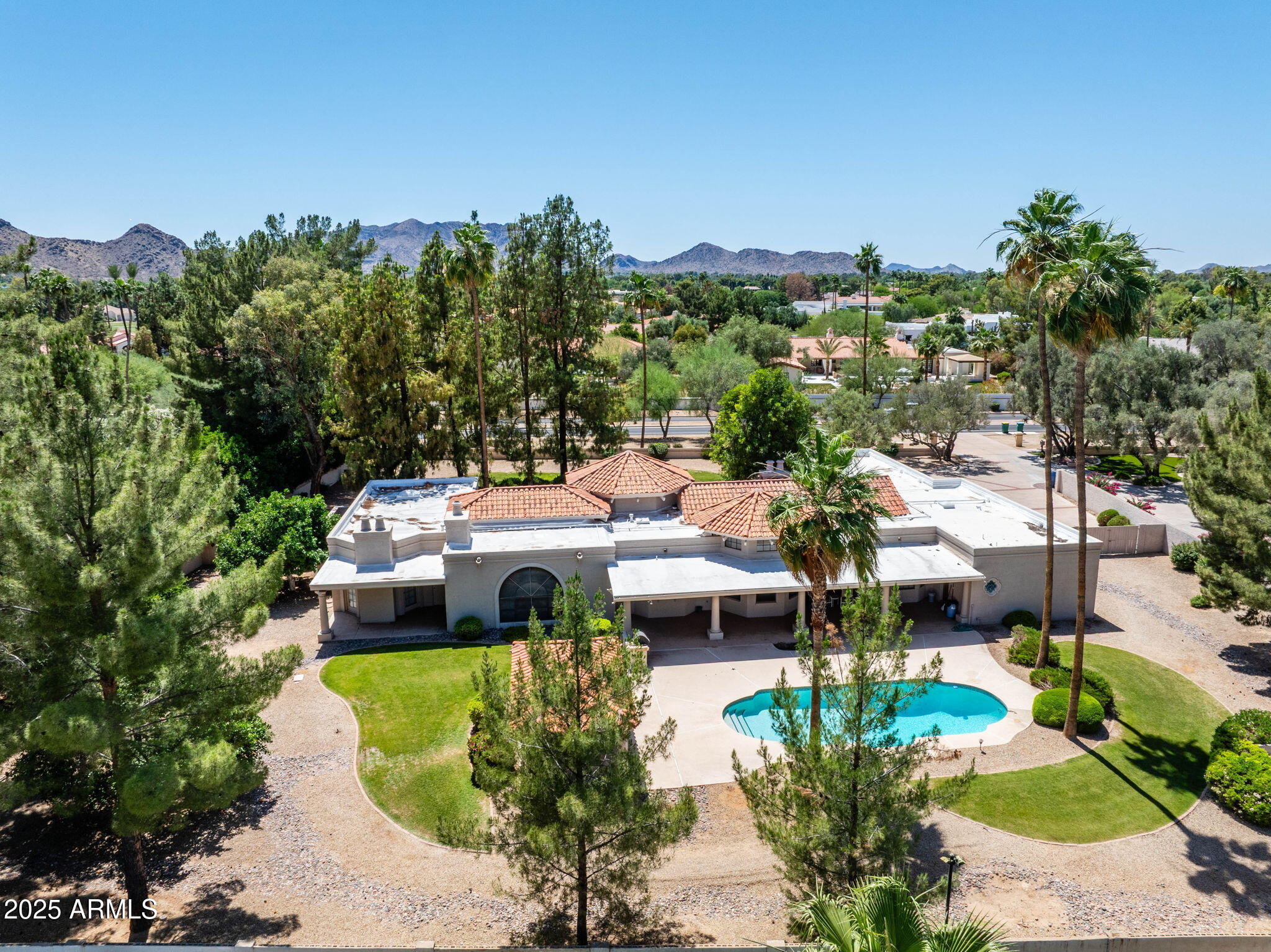 8815 North Invergordon Road Paradise Valley, AZ 85253 - Photo 1 of 22 an aerial view of a house with a garden