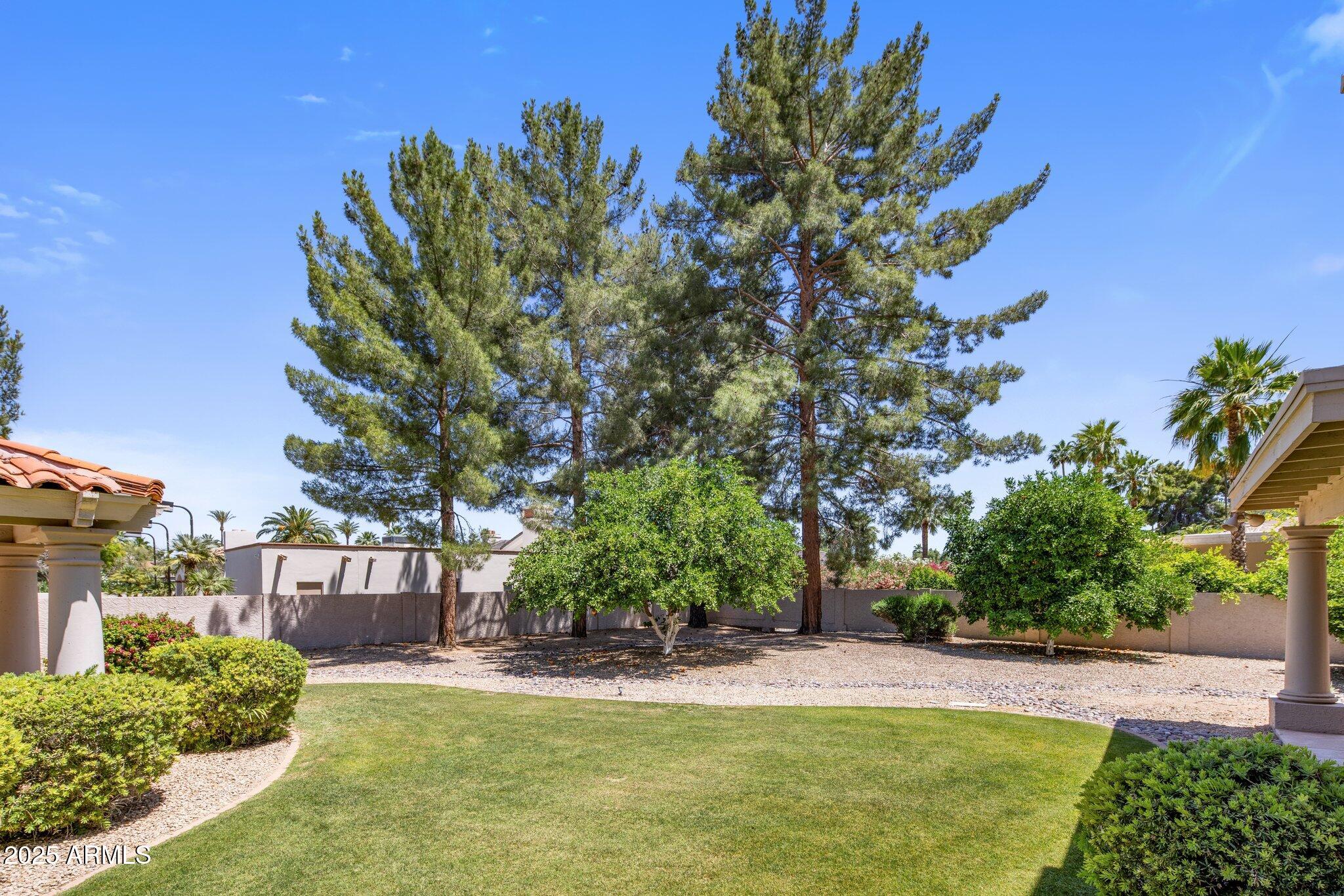 8815 North Invergordon Road Paradise Valley, AZ 85253 - Photo 18 of 22 a view of a house with a yard