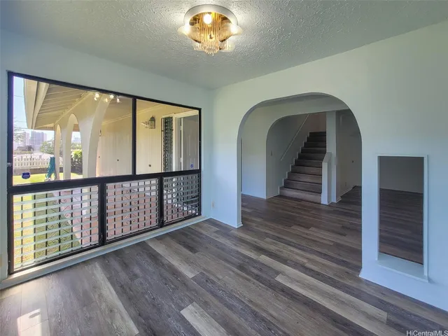 a view of entryway with wooden floor