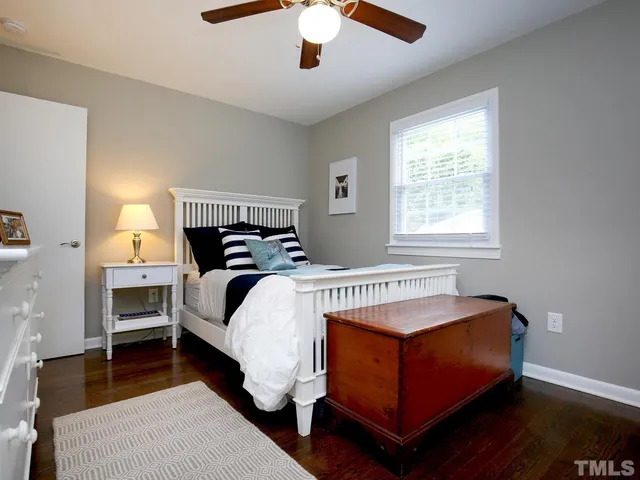 a kitchen with stainless steel appliances granite countertop a stove a sink and a dining table