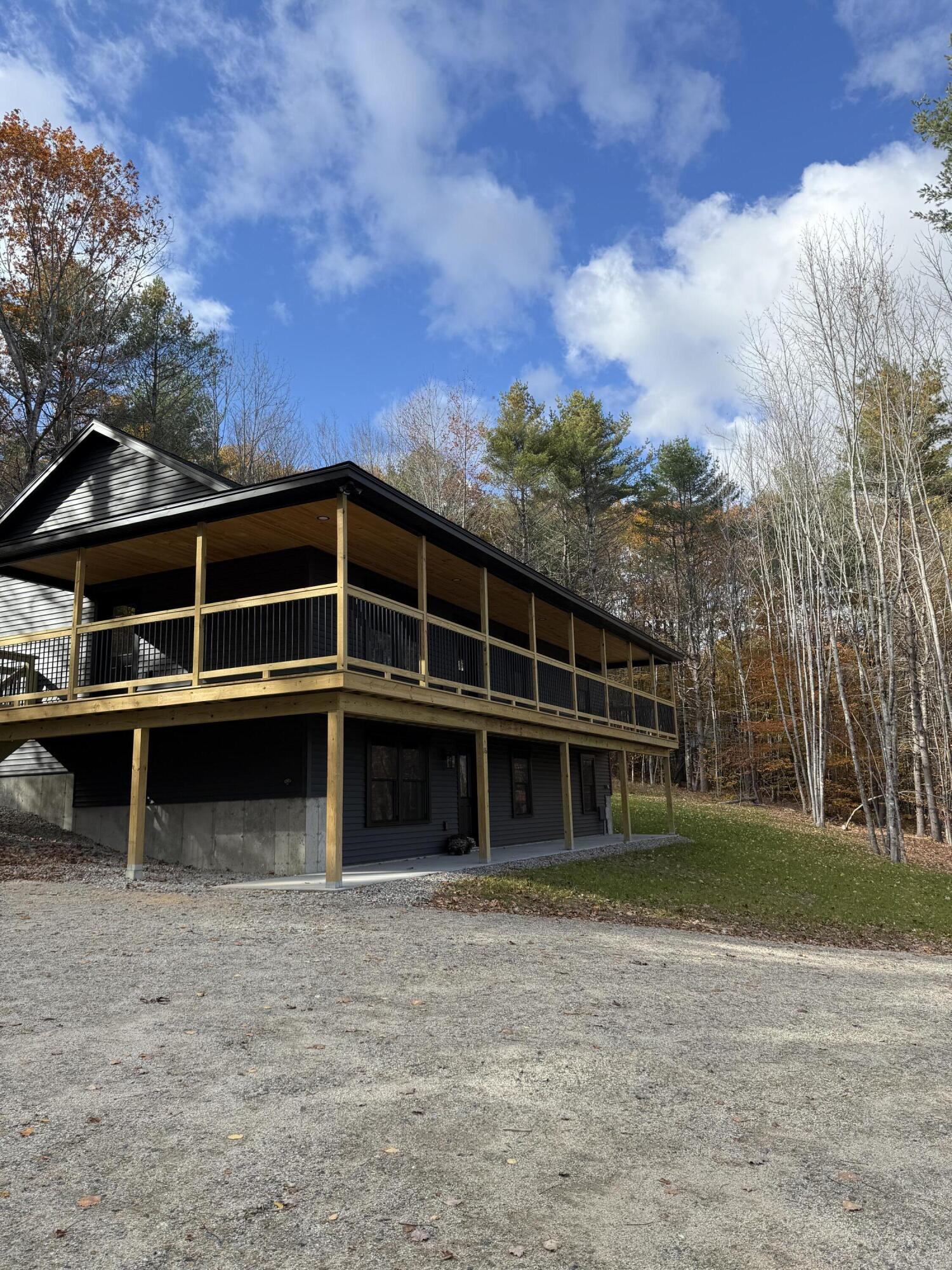35 Pond View Drive Otisfield, ME 04270 - Photo 4 of 48 Beautiful wrap around deck.