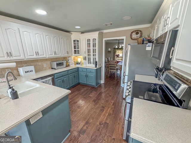 404 Hardwick Drive Macon, GA 31216 - Photo 14 of 21 a kitchen with a sink appliances and cabinets