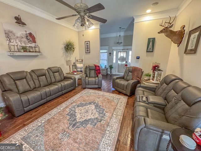 404 Hardwick Drive Macon, GA 31216 - Photo 2 of 21 a living room with furniture and a chandelier