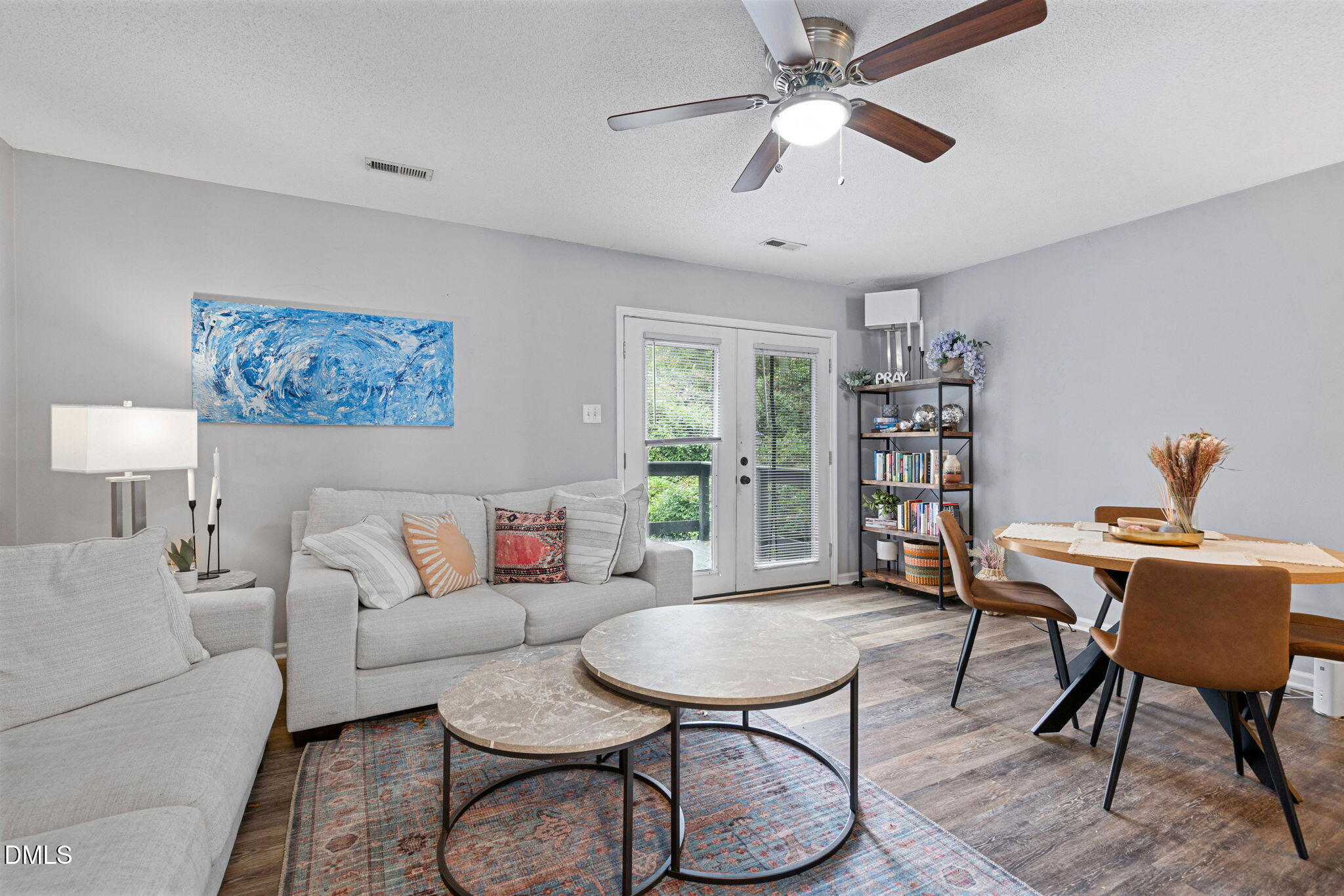215 1/2 Lafayette Road, Unit A Raleigh, NC 27604 - Photo 12 of 39 a living room with furniture a rug and a window