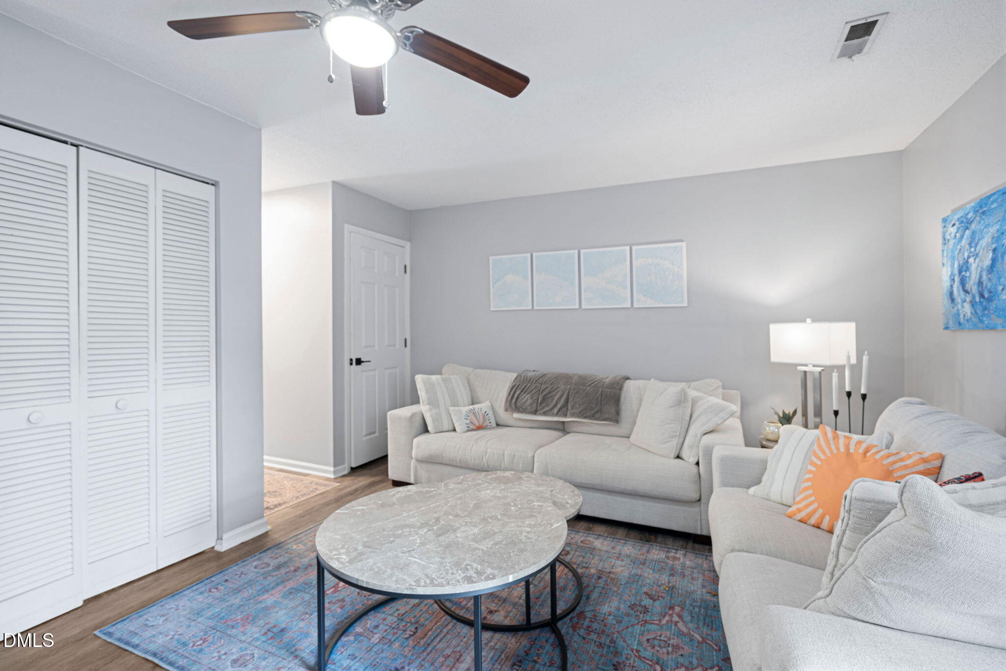 215 1/2 Lafayette Road, Unit A Raleigh, NC 27604 - Photo 14 of 39 a living room with furniture and a wooden floor