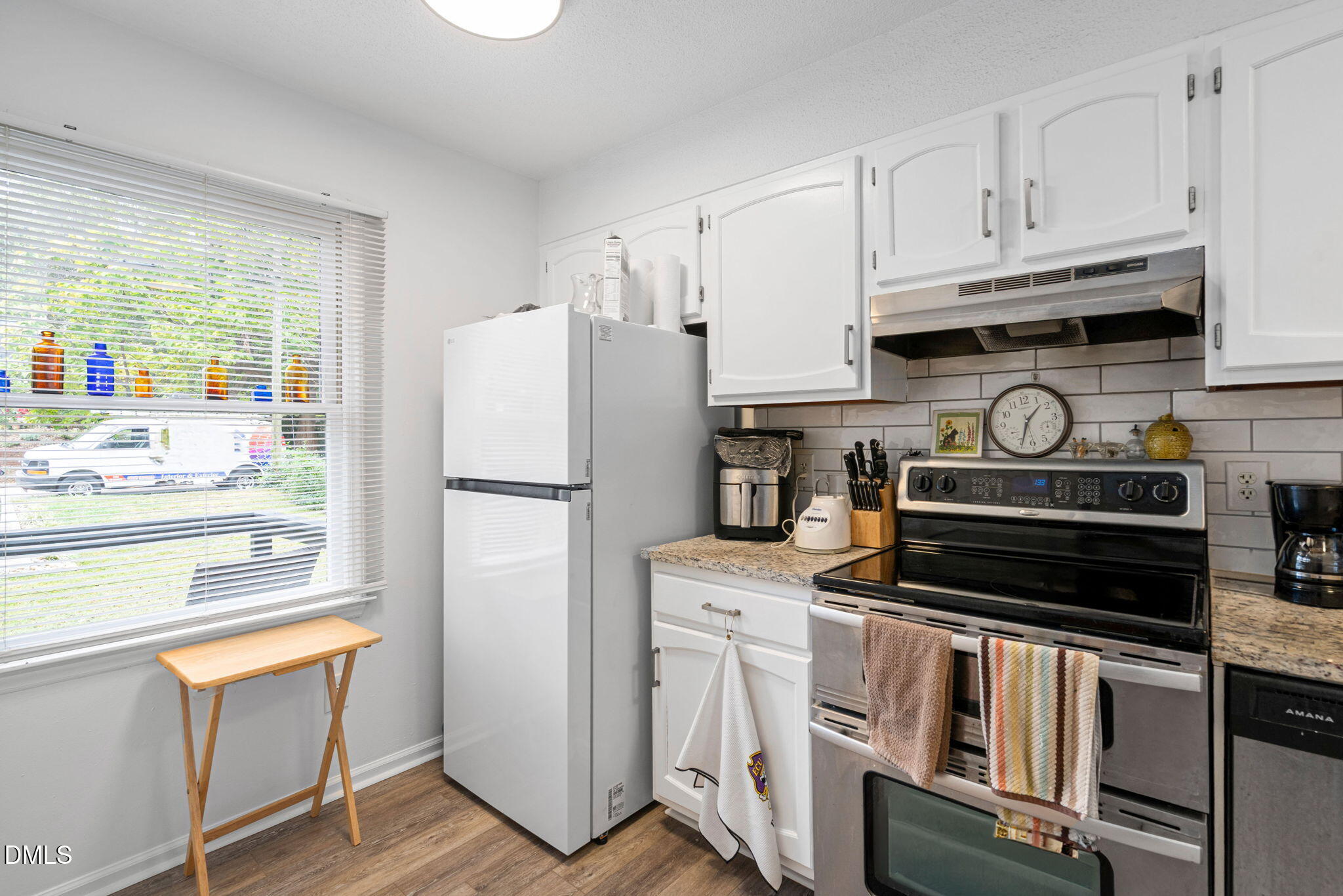 215 1/2 Lafayette Road, Unit A Raleigh, NC 27604 - Photo 16 of 39 a kitchen with appliances and cabinets