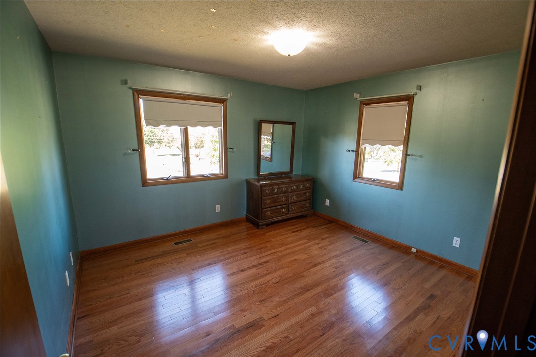 3574 Blose Road Elkton, VA 22827 - Photo 15 of 49 Unfurnished bedroom featuring multiple windows, a