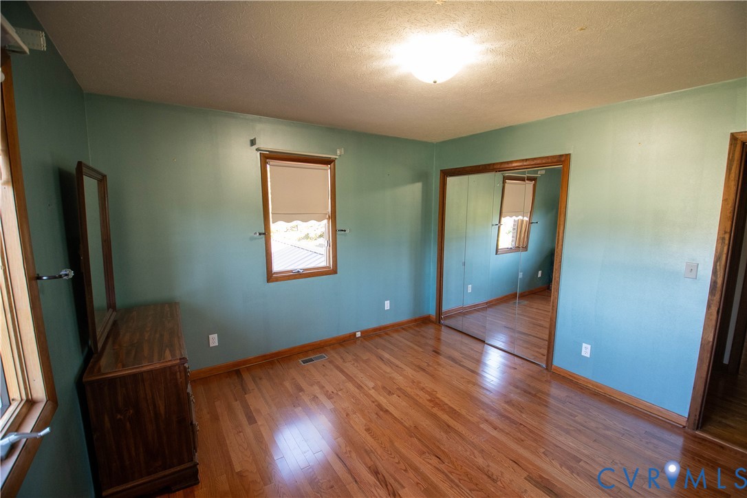 3574 Blose Road Elkton, VA 22827 - Photo 16 of 49 Unfurnished bedroom with a closet, a textured ceil