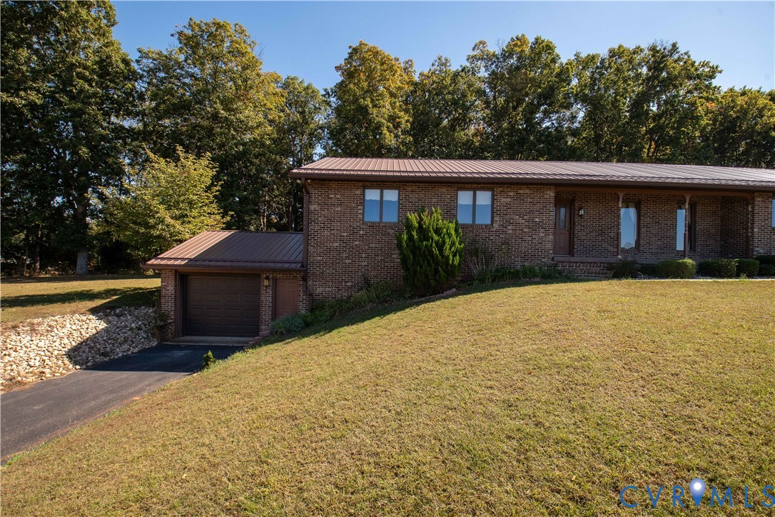3574 Blose Road Elkton, VA 22827 - Photo 4 of 49 View of front of home with brick siding, a metal r