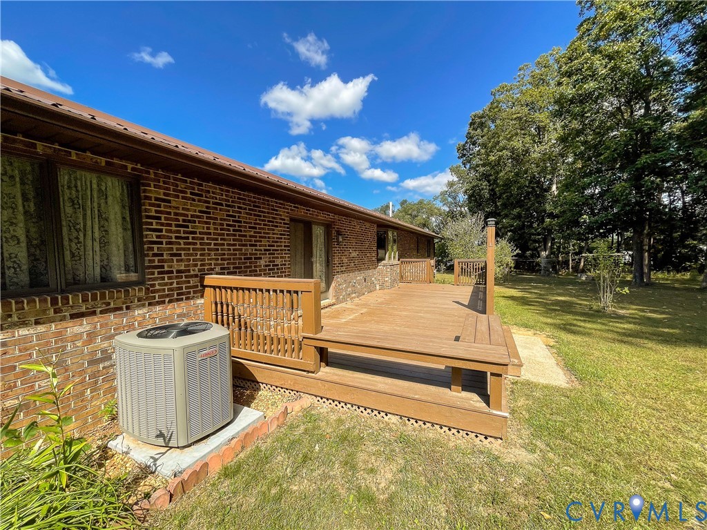 3574 Blose Road Elkton, VA 22827 - Photo 7 of 49 Wooden terrace featuring a lawn