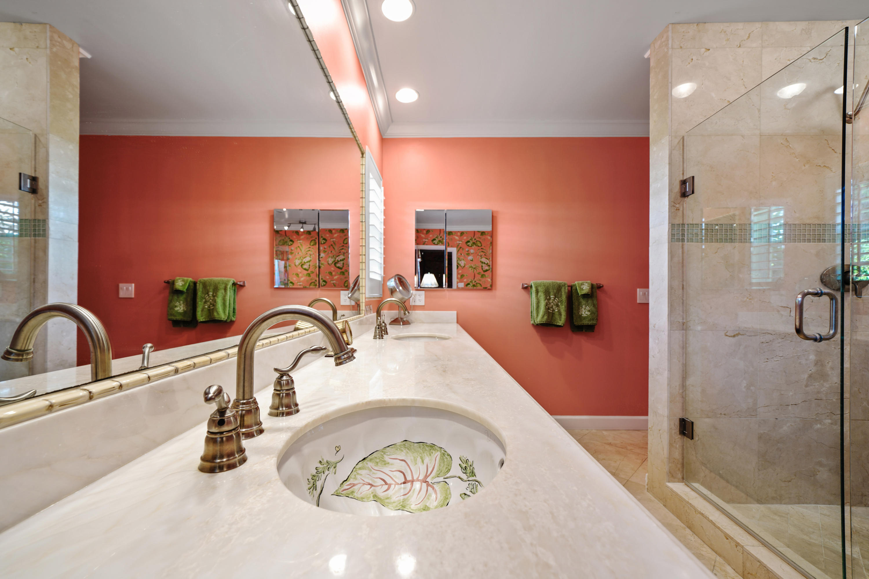 3232 Gulf Stream Road Gulf Stream, FL 33483 - Photo 15 of 36 a bathroom with a sink a mirror and shower