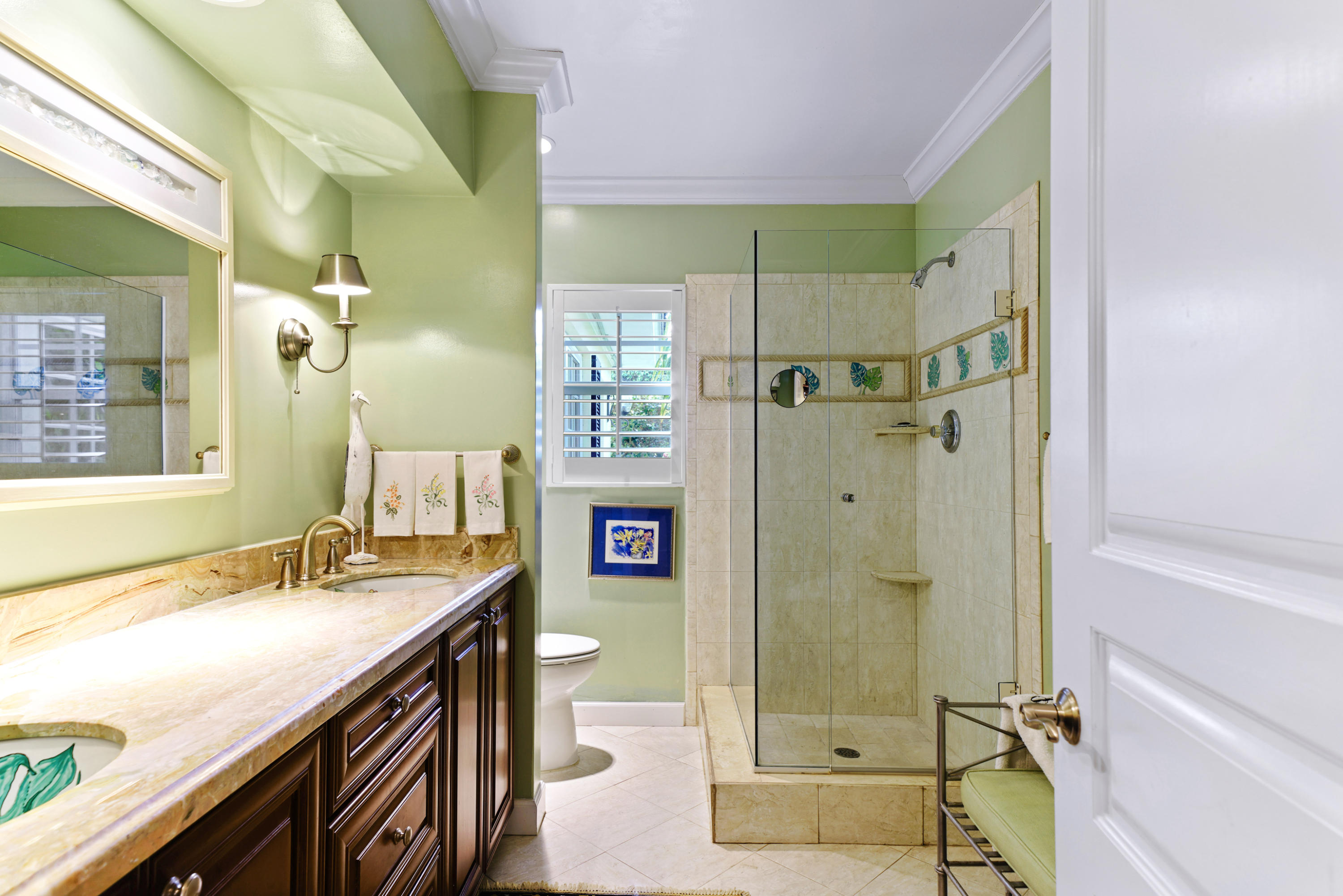 3232 Gulf Stream Road Gulf Stream, FL 33483 - Photo 18 of 36 a bathroom with a sink a toilet and shower