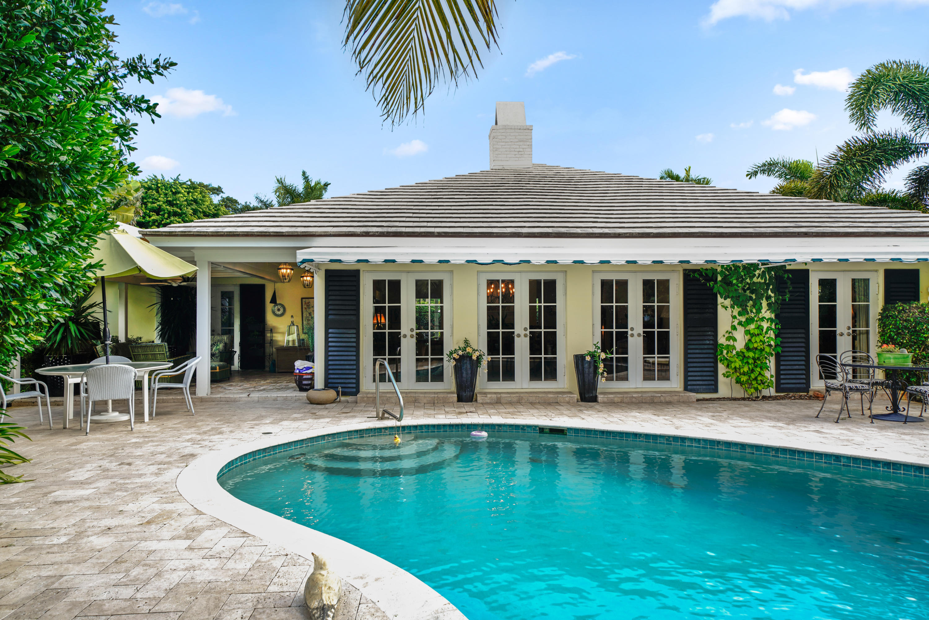 3232 Gulf Stream Road Gulf Stream, FL 33483 - Photo 34 of 36 a view of a house with a yard patio and swimming pool