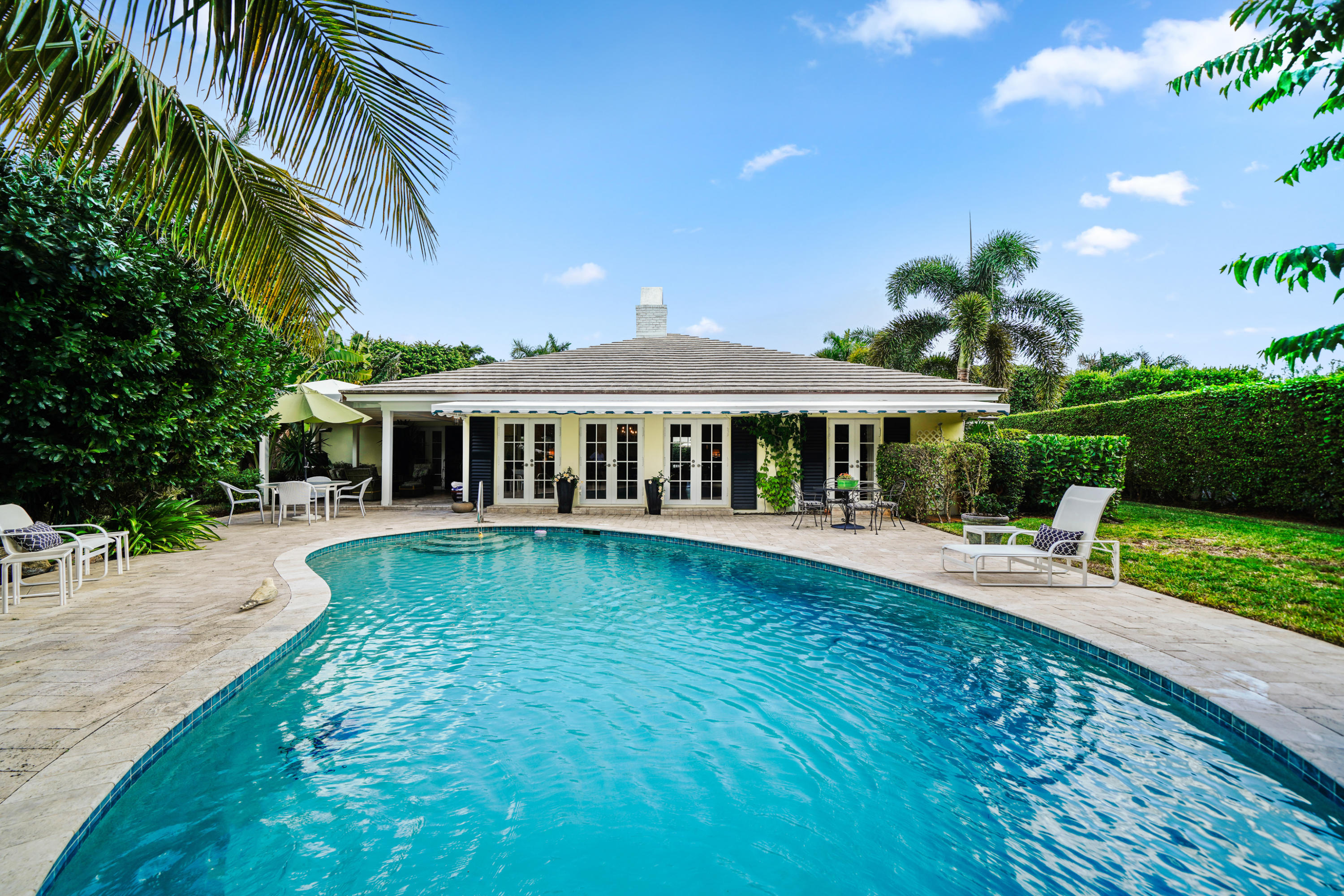 3232 Gulf Stream Road Gulf Stream, FL 33483 - Photo 35 of 36 a front view of house with yard and outdoor seating