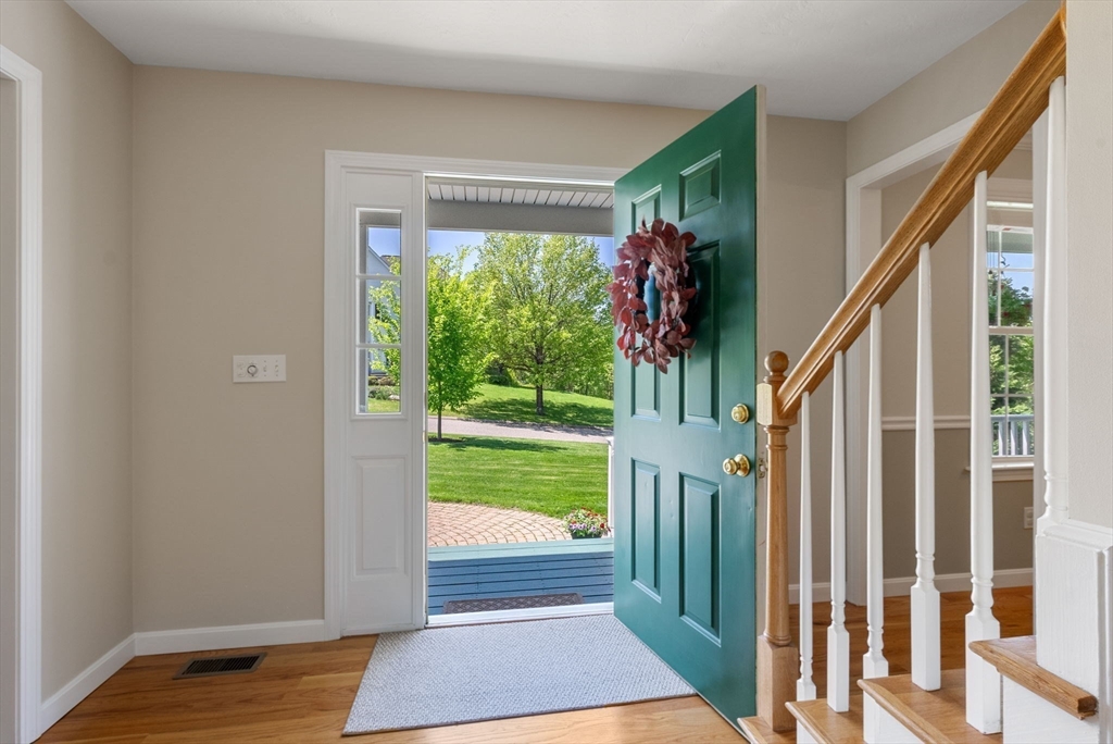 7 Brook Hill Road Sturbridge, MA 01518 - Photo 11 of 41 a view of entryway with a front door and wooden floor