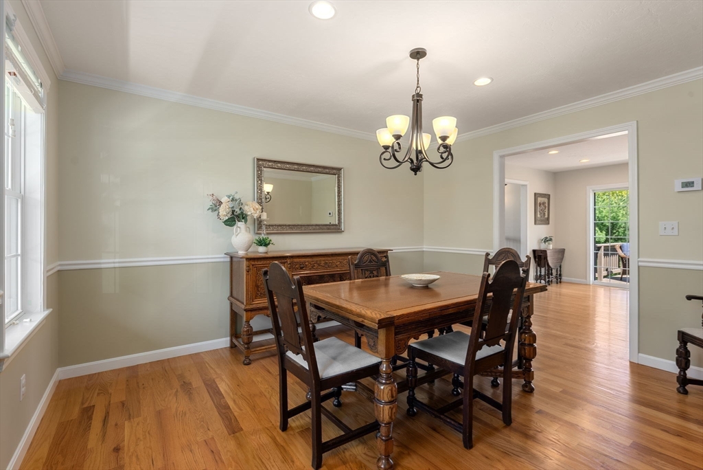 7 Brook Hill Road Sturbridge, MA 01518 - Photo 22 of 41 a view of a dining room with furniture and wooden floor
