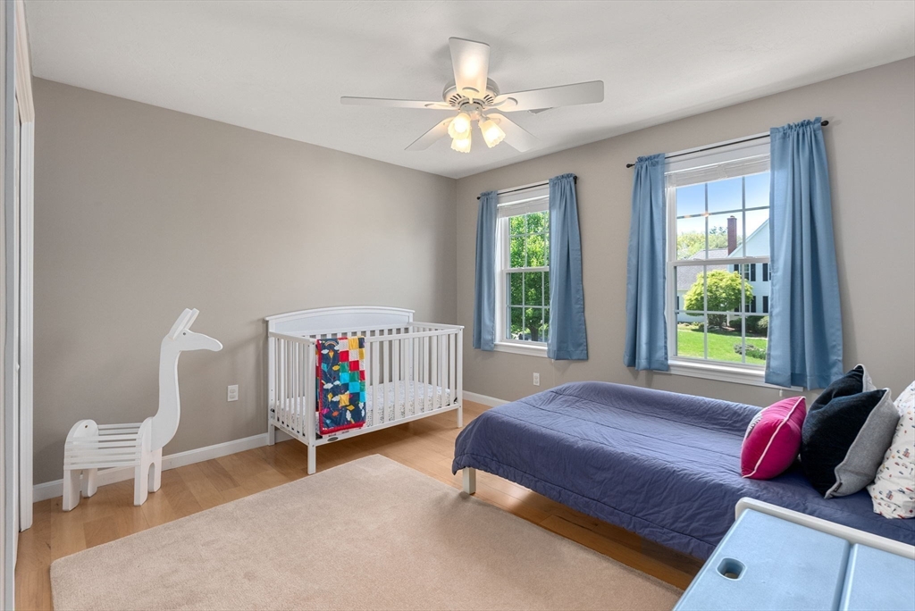 7 Brook Hill Road Sturbridge, MA 01518 - Photo 31 of 41 a bedroom with furniture and a large window
