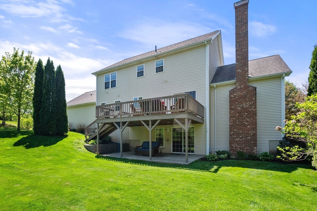 7 Brook Hill Road Sturbridge, MA 01518 - Photo 39 of 41 a view of a house with a yard and sitting area