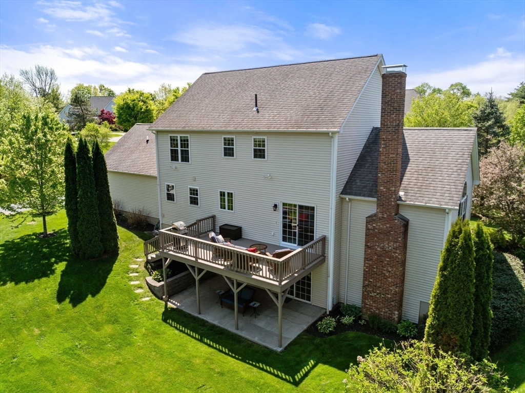 7 Brook Hill Road Sturbridge, MA 01518 - Photo 40 of 41 a aerial view of a house with a yard patio and slide