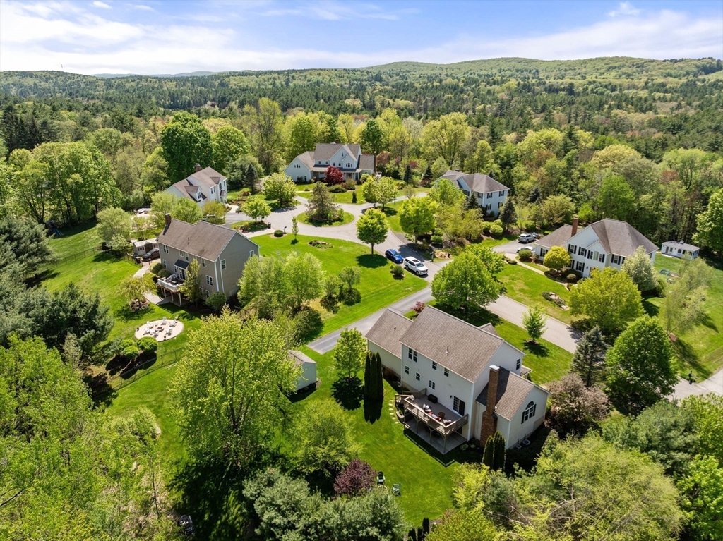 7 Brook Hill Road Sturbridge, MA 01518 - Photo 8 of 41 an aerial view of a house with a yard