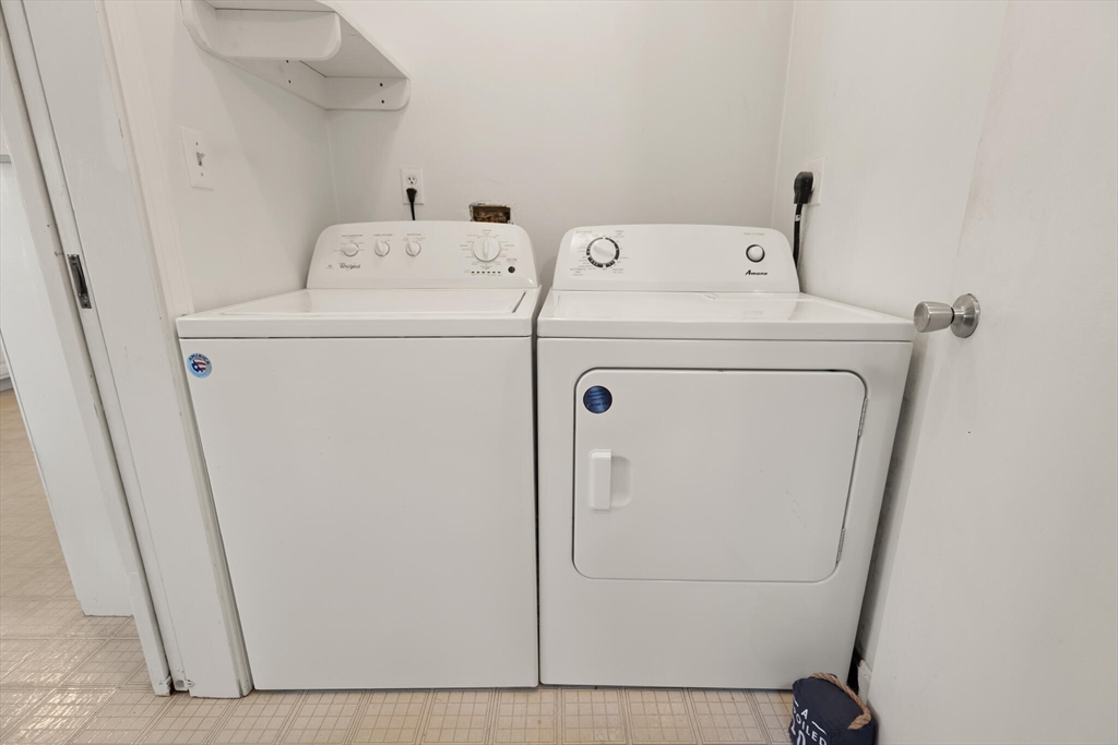 35 Roosevelt Street, Unit 35 Maynard, MA 01754 - Photo 26 of 39 a utility room with dryer and washer