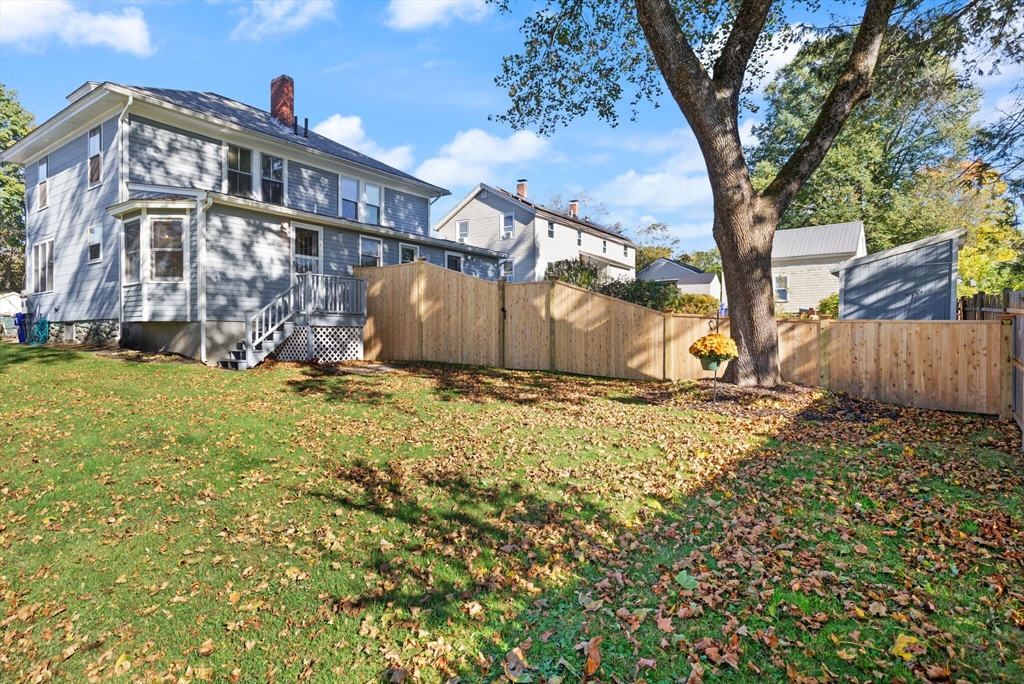 35 Roosevelt Street, Unit 35 Maynard, MA 01754 - Photo 36 of 39 a view of a house with a yard