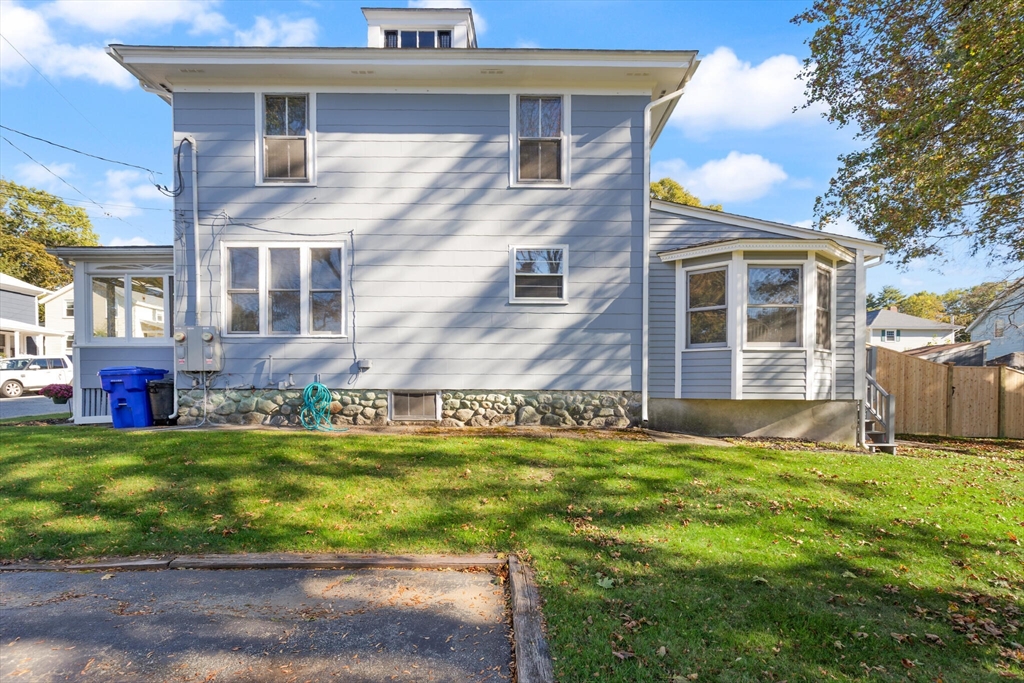 35 Roosevelt Street, Unit 35 Maynard, MA 01754 - Photo 37 of 39 a view of a house with a yard