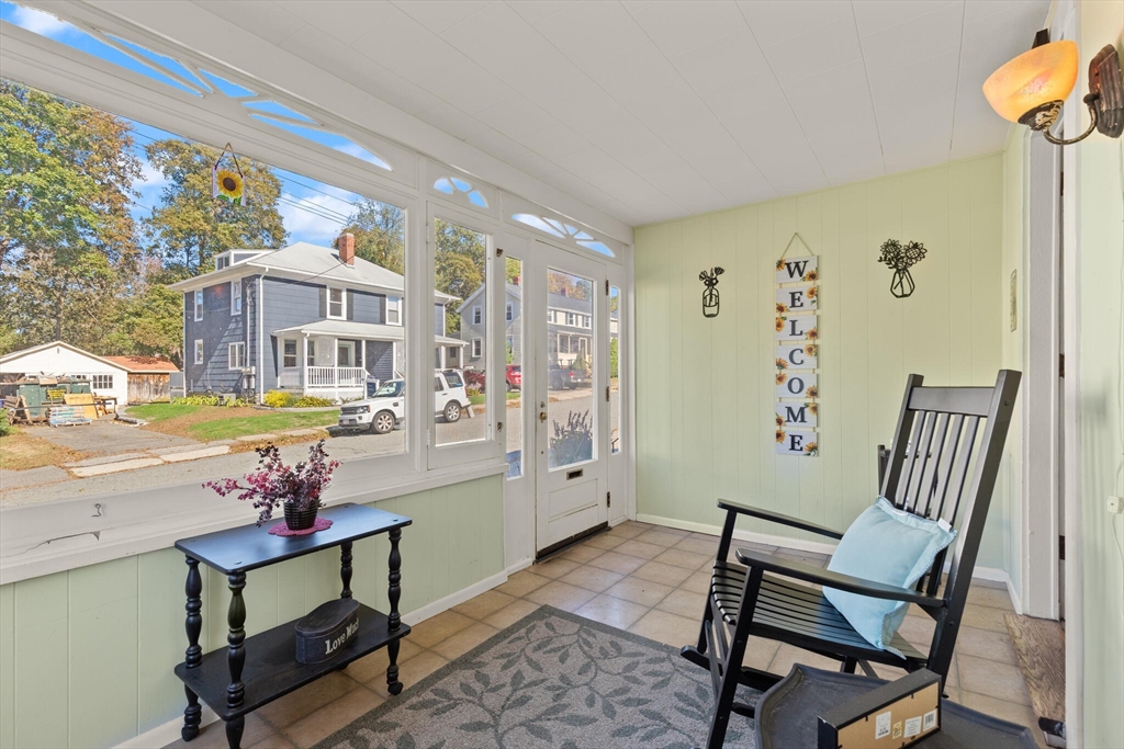 35 Roosevelt Street, Unit 35 Maynard, MA 01754 - Photo 6 of 39 a view of a livingroom with furniture and a window