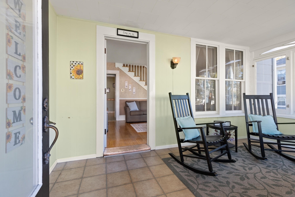 35 Roosevelt Street, Unit 35 Maynard, MA 01754 - Photo 8 of 39 a view of a hallway with seating area